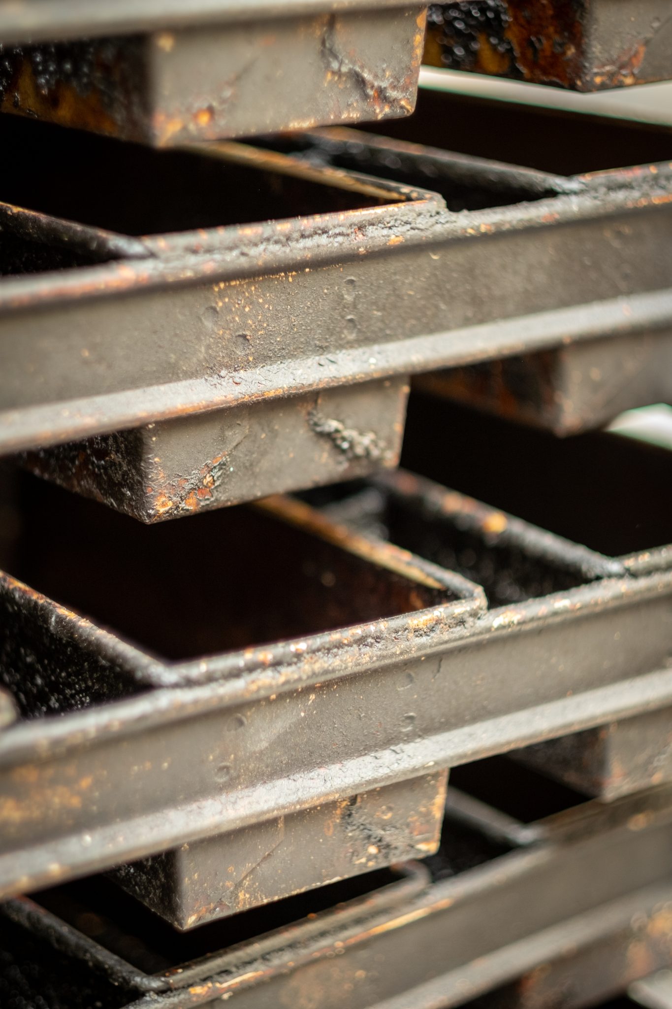 Stacked baking trays in a bakery